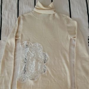 Dolce and Gabbana cream turtle neck